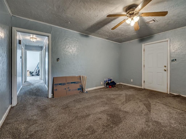 109 E Northrup Dr, Oklahoma City, OK 73110 - empty room featuring ceiling fan, carpet flooring, attic access, a textured ceiling, and a textured wall