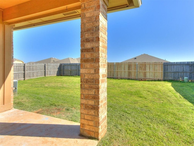 13312 4th Ter, Yukon, OK 73099 - fenced backyard featuring a patio