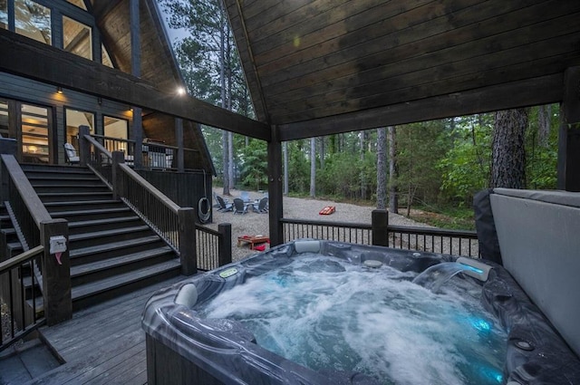 316 Triton Trl, Broken Bow, OK 74728 - deck featuring a hot tub and stairs