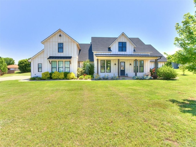 22795 Cterling Dr, Kingfisher, OK 73750 - modern farmhouse style home featuring board and batten siding and a front yard