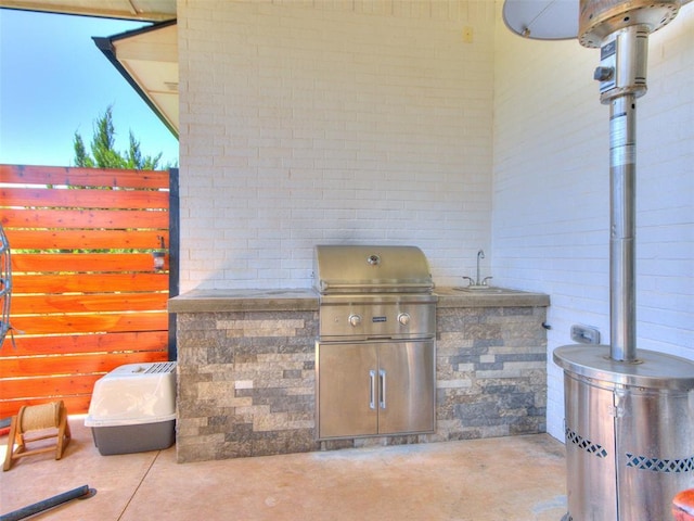 22795 Cterling Dr, Kingfisher, OK 73750 - view of patio with an outdoor kitchen and a sink