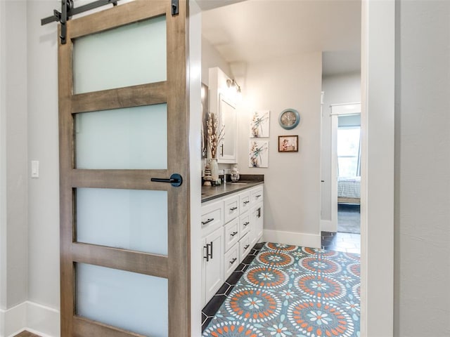 22795 Cterling Dr, Kingfisher, OK 73750 - bathroom featuring double vanity and tile patterned floors