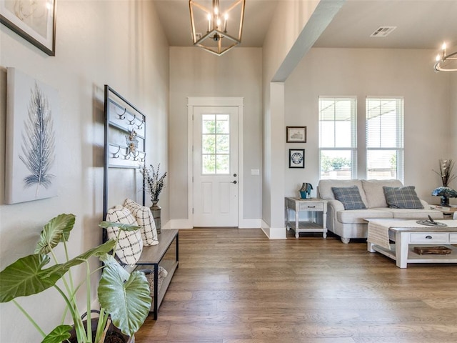 22795 Cterling Dr, Kingfisher, OK 73750 - entrance foyer with a chandelier and wood finished floors
