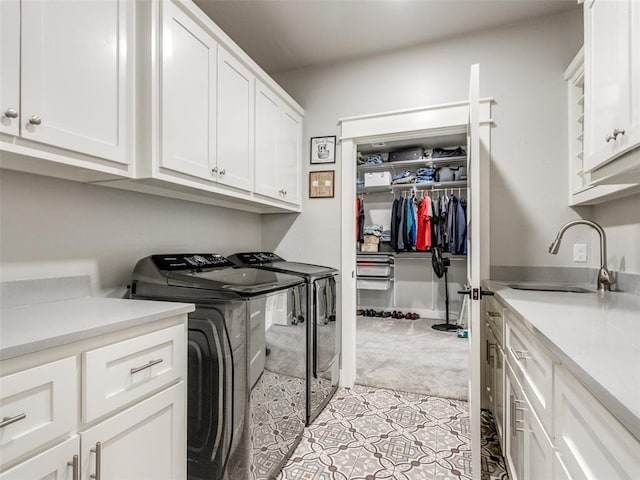 22795 Cterling Dr, Kingfisher, OK 73750 - washroom featuring cabinet space, independent washer and dryer, light colored carpet, and light tile patterned floors