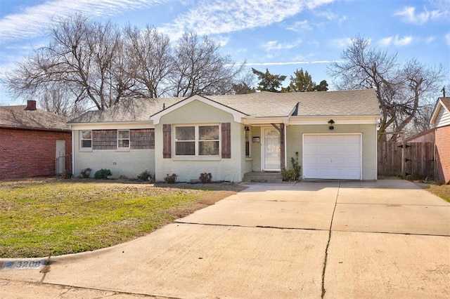 3208 NW 47th St, Oklahoma City, OK 73112 - ranch-style home featuring brick siding, a garage, driveway, and roof with shingles