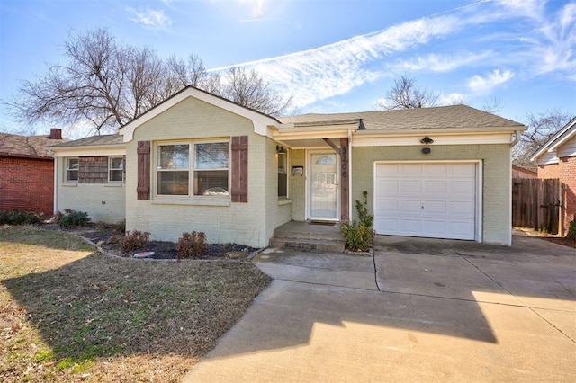 3208 NW 47th St, Oklahoma City, OK 73112 - ranch-style home featuring brick siding, a garage, driveway, and roof with shingles