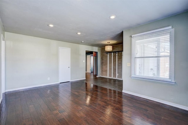 3208 NW 47th St, Oklahoma City, OK 73112 - unfurnished living room with wood finished floors and recessed lighting