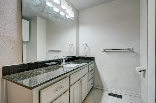 3208 NW 47th St, Oklahoma City, OK 73112 - bathroom with vanity and tile patterned floors