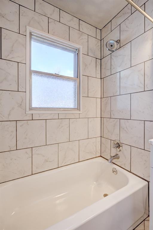 3208 NW 47th St, Oklahoma City, OK 73112 - full bathroom featuring shower / bath combination