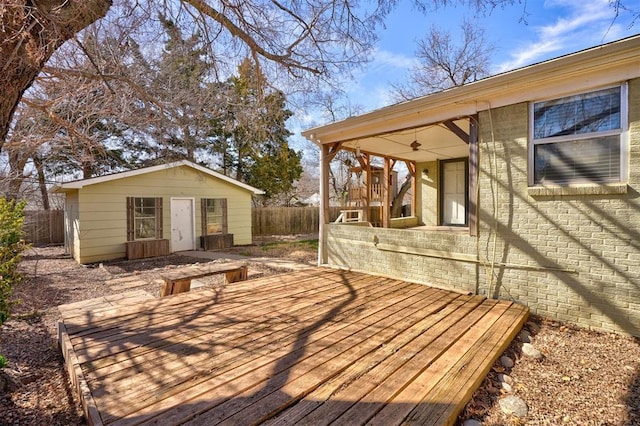 3208 NW 47th St, Oklahoma City, OK 73112 - wooden deck with an outdoor structure and ceiling fan