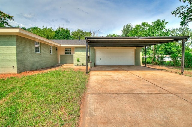 5309 S Blackwelder Ave, Oklahoma City, OK 73119 - view of front of house with brick siding, a garage, concrete driveway, and a front lawn