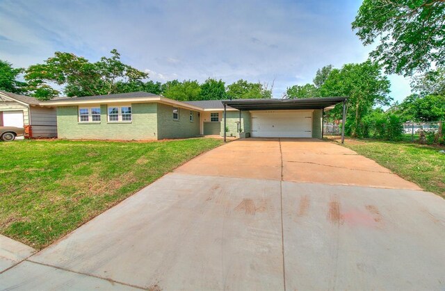 5309 S Blackwelder Ave, Oklahoma City, OK 73119 - single story home featuring a carport, driveway, a garage, and brick siding