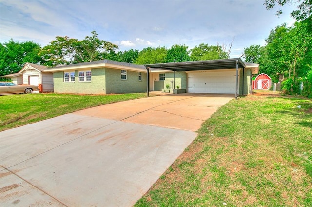 5309 S Blackwelder Ave, Oklahoma City, OK 73119 - ranch-style house with a shed, concrete driveway, a front lawn, a carport, and an attached garage