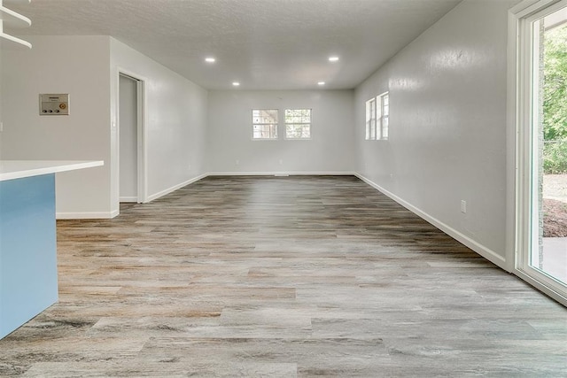 5309 S Blackwelder Ave, Oklahoma City, OK 73119 - empty room featuring wood finished floors and recessed lighting