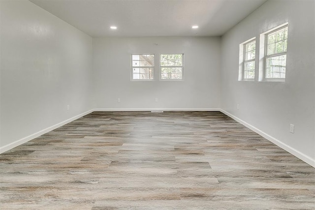 5309 S Blackwelder Ave, Oklahoma City, OK 73119 - spare room with wood finished floors and recessed lighting