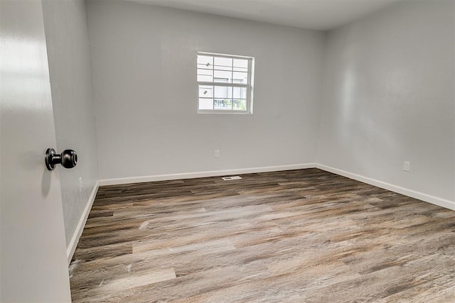 5309 S Blackwelder Ave, Oklahoma City, OK 73119 - empty room with wood finished floors and baseboards