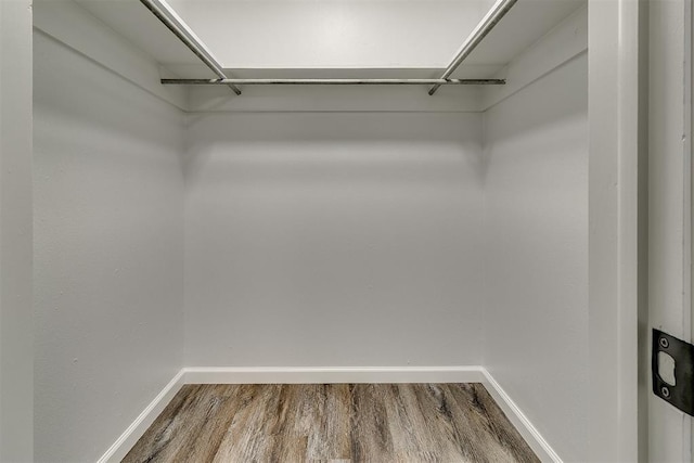 5309 S Blackwelder Ave, Oklahoma City, OK 73119 - spacious closet featuring dark wood-style flooring