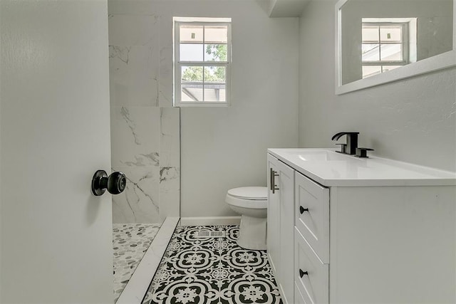 5309 S Blackwelder Ave, Oklahoma City, OK 73119 - full bathroom featuring a marble finish shower and vanity
