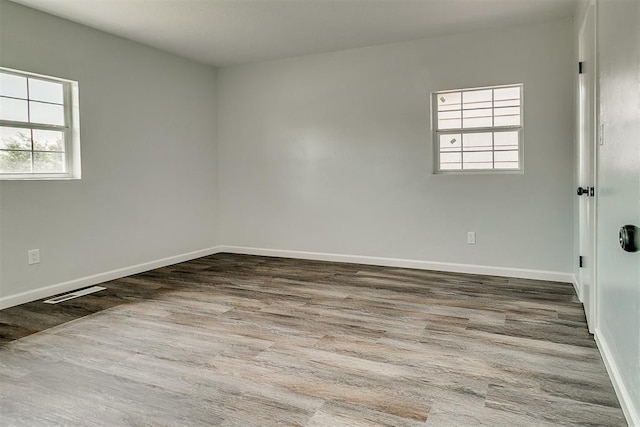 5309 S Blackwelder Ave, Oklahoma City, OK 73119 - unfurnished room with baseboards and wood finished floors