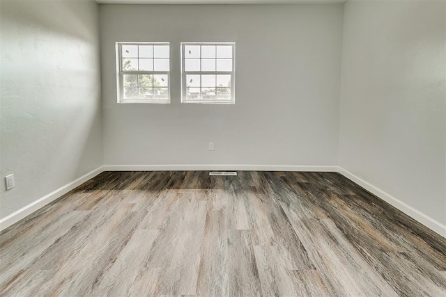 5309 S Blackwelder Ave, Oklahoma City, OK 73119 - unfurnished room featuring baseboards and wood finished floors