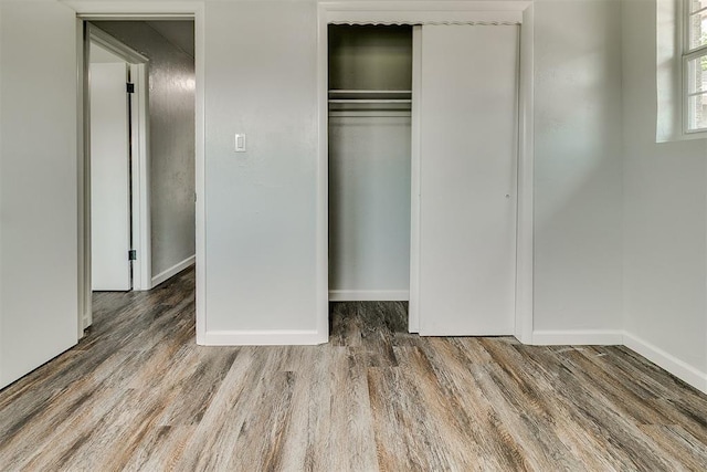 5309 S Blackwelder Ave, Oklahoma City, OK 73119 - unfurnished bedroom with wood finished floors and a closet