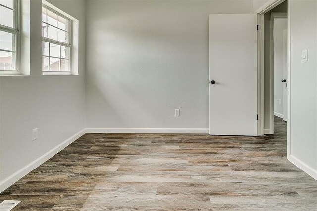 5309 S Blackwelder Ave, Oklahoma City, OK 73119 - unfurnished room featuring wood finished floors and baseboards
