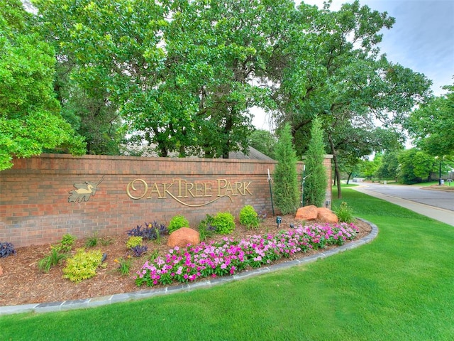 4304 Riders Mark, Edmond, OK 73025 - community / neighborhood sign featuring a lawn