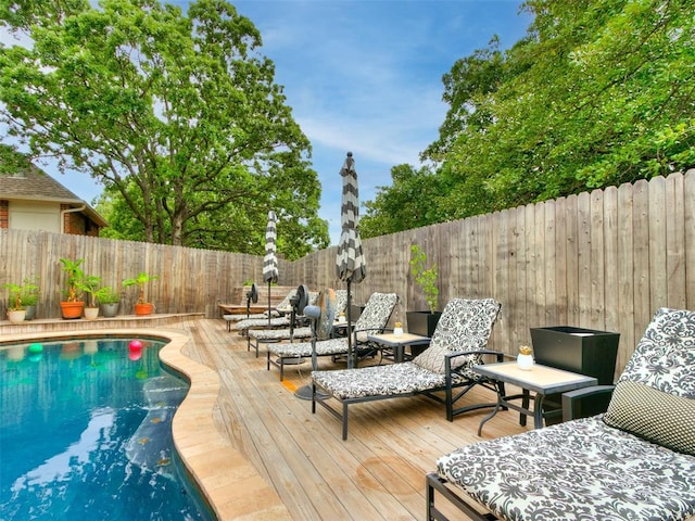4304 Riders Mark, Edmond, OK 73025 - view of pool featuring a deck and a fenced backyard