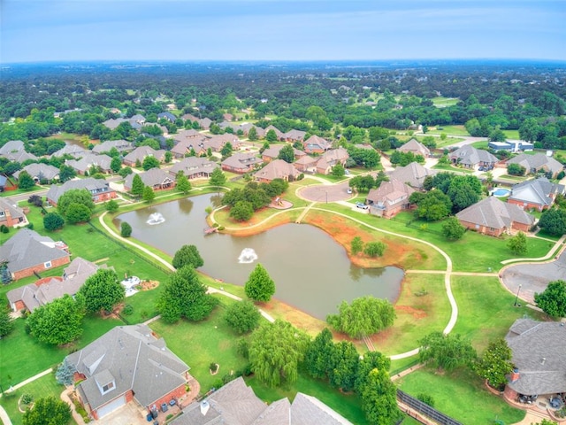 4304 Riders Mark, Edmond, OK 73025 - aerial perspective of suburban area with a large body of water