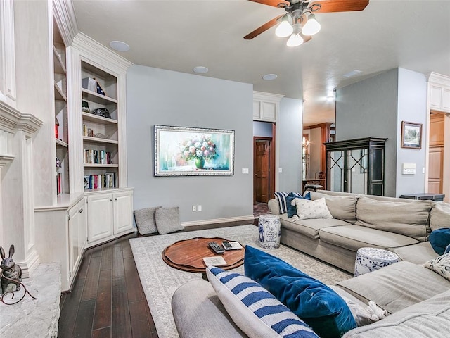 4304 Riders Mark, Edmond, OK 73025 - living area with a ceiling fan, dark wood-style floors, and a fireplace