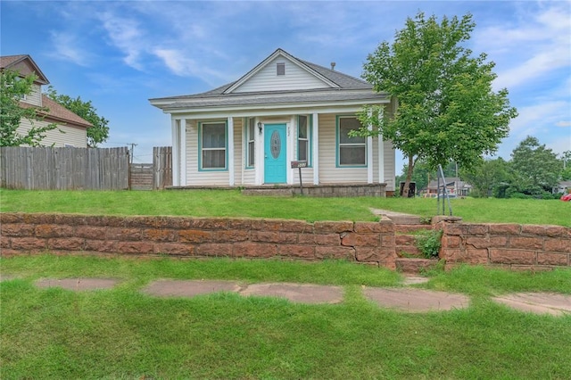 502 S 7th St, Chickasha, OK 73018 - view of front facade with covered porch