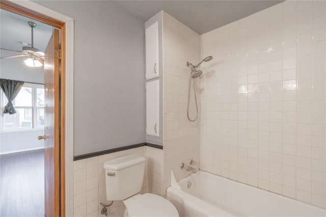 502 S 7th St, Chickasha, OK 73018 - full bathroom with shower / washtub combination, ceiling fan, and tile walls