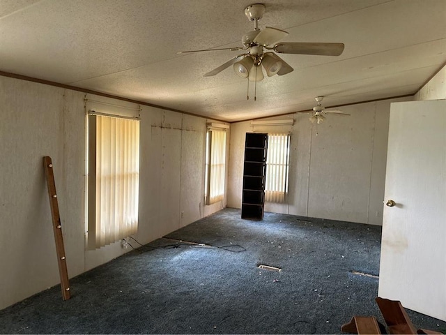 1194 County Street 2955 St, Tuttle, OK 73089 - empty room featuring carpet flooring, ceiling fan, and a textured ceiling