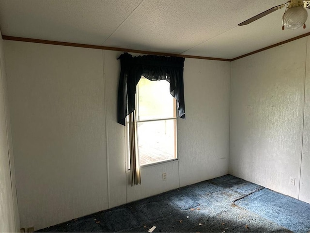 1194 County Street 2955 St, Tuttle, OK 73089 - unfurnished room featuring crown molding, a ceiling fan, and a textured ceiling
