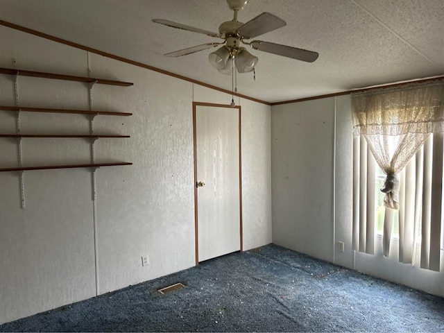 1194 County Street 2955 St, Tuttle, OK 73089 - empty room with carpet floors, a ceiling fan, ornamental molding, and a textured ceiling