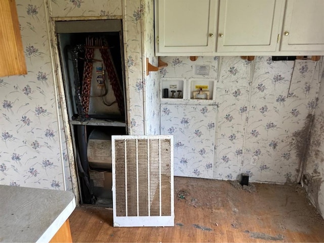 1194 County Street 2955 St, Tuttle, OK 73089 - laundry area with wood finished floors, wallpapered walls, cabinet space, and washer hookup