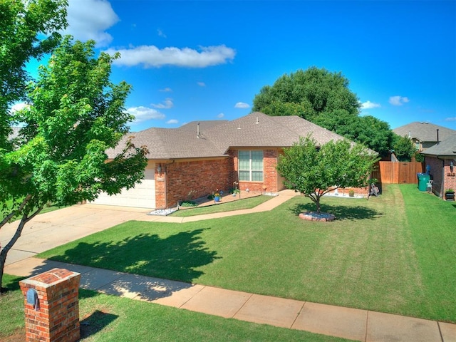 517 Firefork Ave, Yukon, OK 73099 - ranch-style home featuring brick siding, concrete driveway, a garage, and a shingled roof