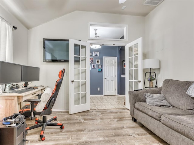 517 Firefork Ave, Yukon, OK 73099 - office space with french doors, wood finished floors, and vaulted ceiling
