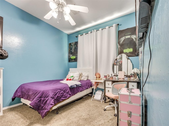 517 Firefork Ave, Yukon, OK 73099 - carpeted bedroom with a ceiling fan and baseboards