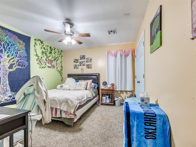 517 Firefork Ave, Yukon, OK 73099 - bedroom with carpet floors and ceiling fan