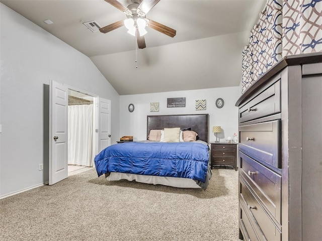 517 Firefork Ave, Yukon, OK 73099 - bedroom with vaulted ceiling, carpet flooring, and ceiling fan