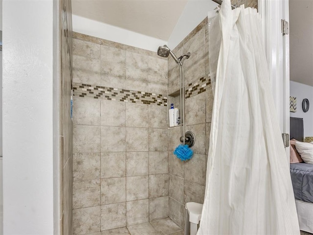 517 Firefork Ave, Yukon, OK 73099 - bathroom featuring a tile shower