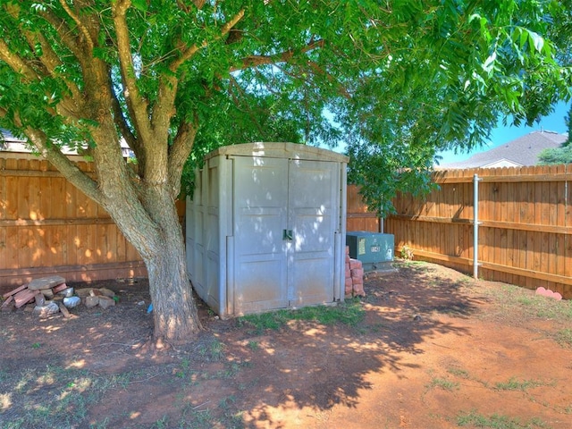 517 Firefork Ave, Yukon, OK 73099 - view of shed with a fenced backyard