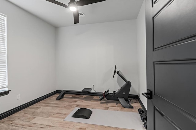 1031 Colonial Ave, Tuttle, OK 73089 - workout room featuring a ceiling fan and wood finished floors