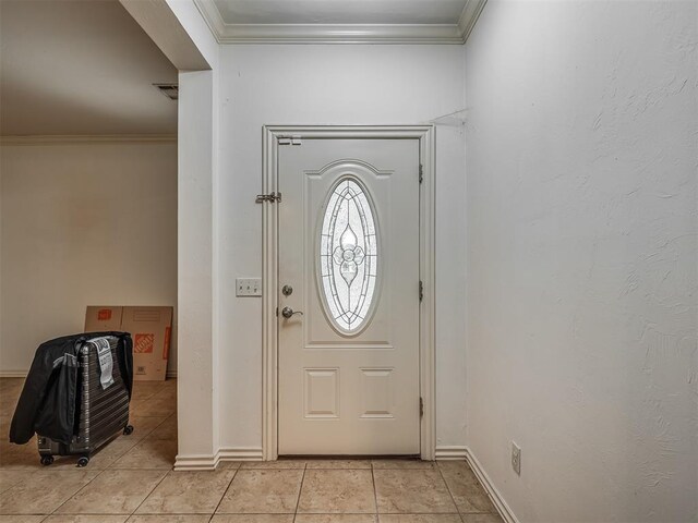 2909 Marigold Ln, Edmond, OK 73013 - entrance foyer featuring ornamental molding and light tile patterned flooring