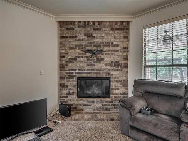 2909 Marigold Ln, Edmond, OK 73013 - living area featuring ornamental molding, carpet floors, and a fireplace