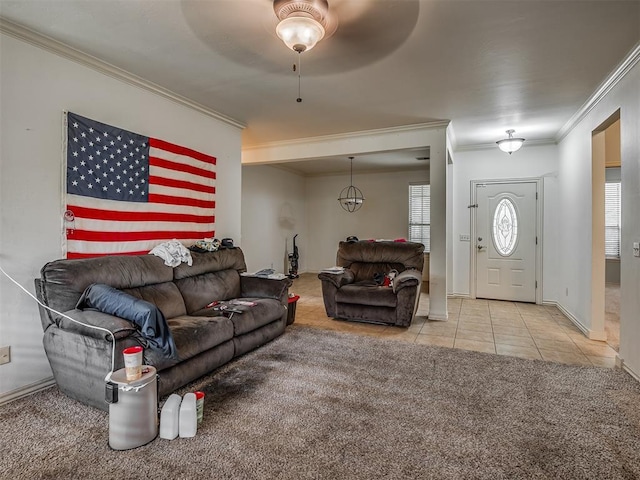 2909 Marigold Ln, Edmond, OK 73013 - living area featuring crown molding, tile patterned floors, carpet flooring, and a ceiling fan