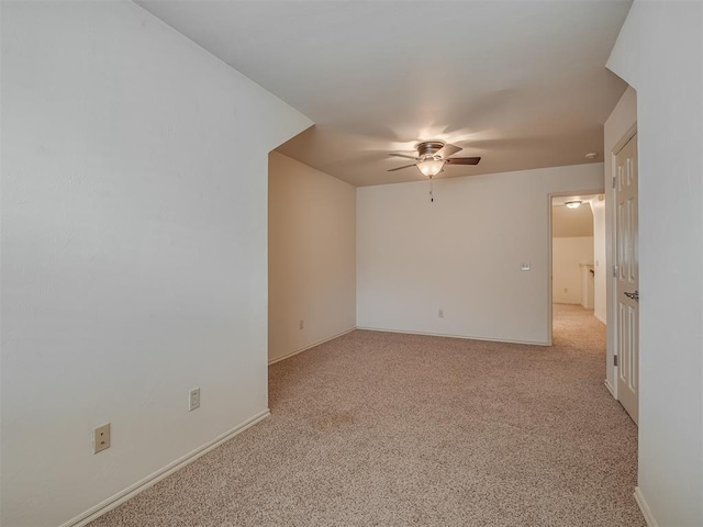 2909 Marigold Ln, Edmond, OK 73013 - spare room with ceiling fan and light carpet