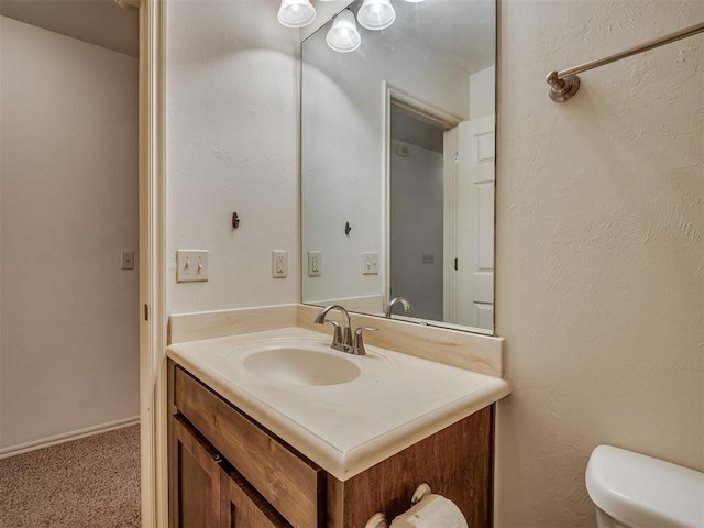 2909 Marigold Ln, Edmond, OK 73013 - bathroom featuring vanity and toilet
