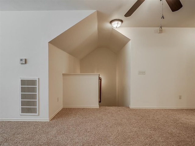 2909 Marigold Ln, Edmond, OK 73013 - additional living space with carpet, ceiling fan, and lofted ceiling